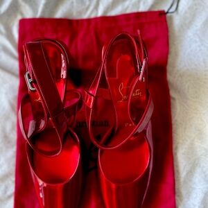 Christian Loubutin Shoes never use.Color red for woman’s. Red button.Exclusives